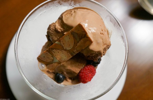 chocolate ice cream with fancy chocolate and berries